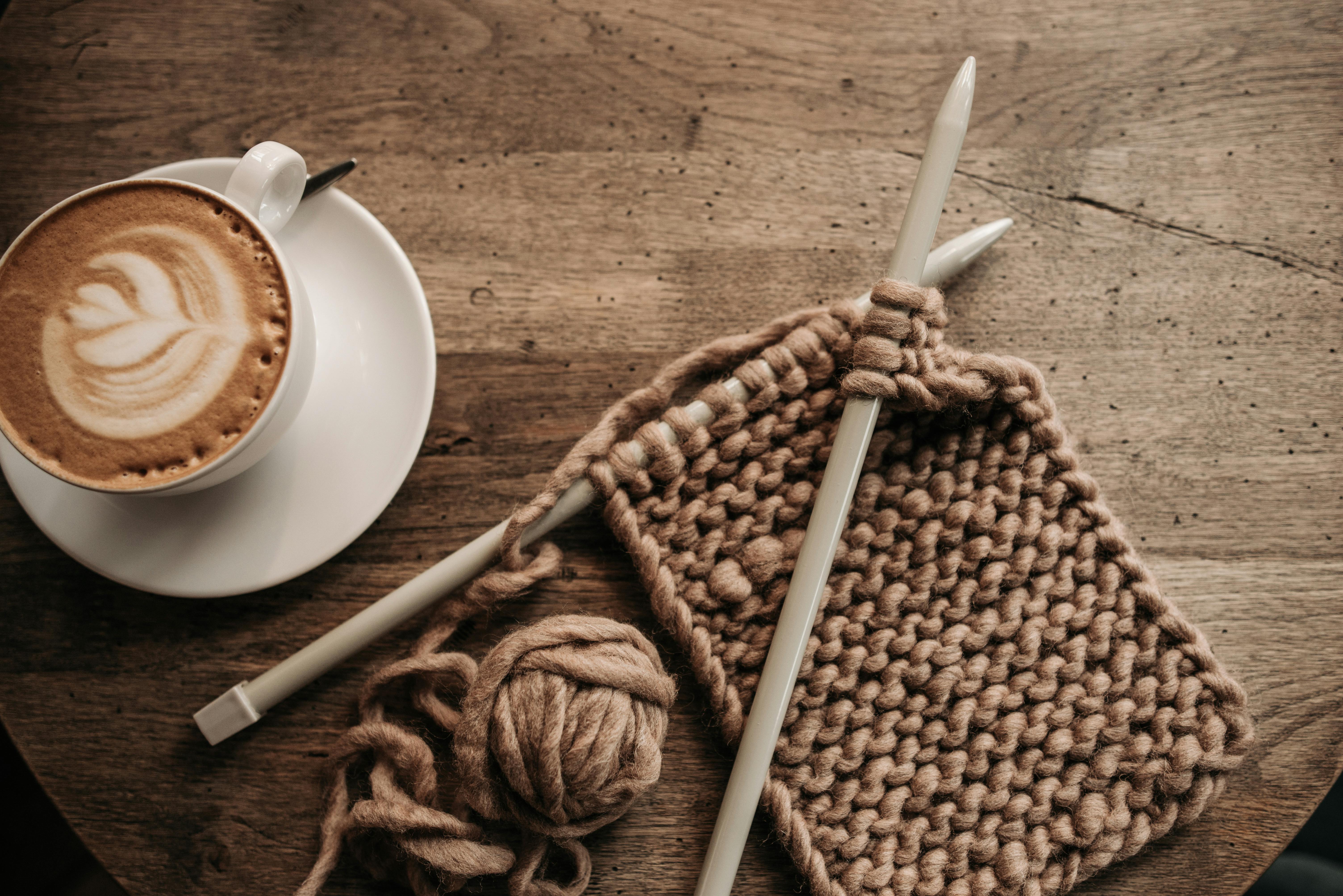 A picture of knitting materials and coffee